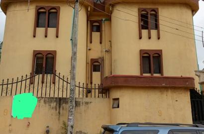 2 storey building with a paint house consist of 8 blocks of 3bedroom flats with 2 toilets with a room self