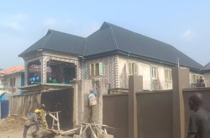 A Decent 4 nos of 2bedroom flats up & down on a Half plot of Land @ st Paul Angelican Church, Oke Afa