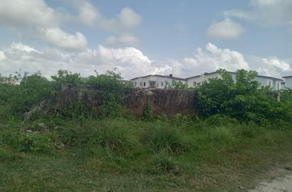5 Acres of  partly fenced in a built up environment @ off Monastery Road, Sangotedo, Ajah
