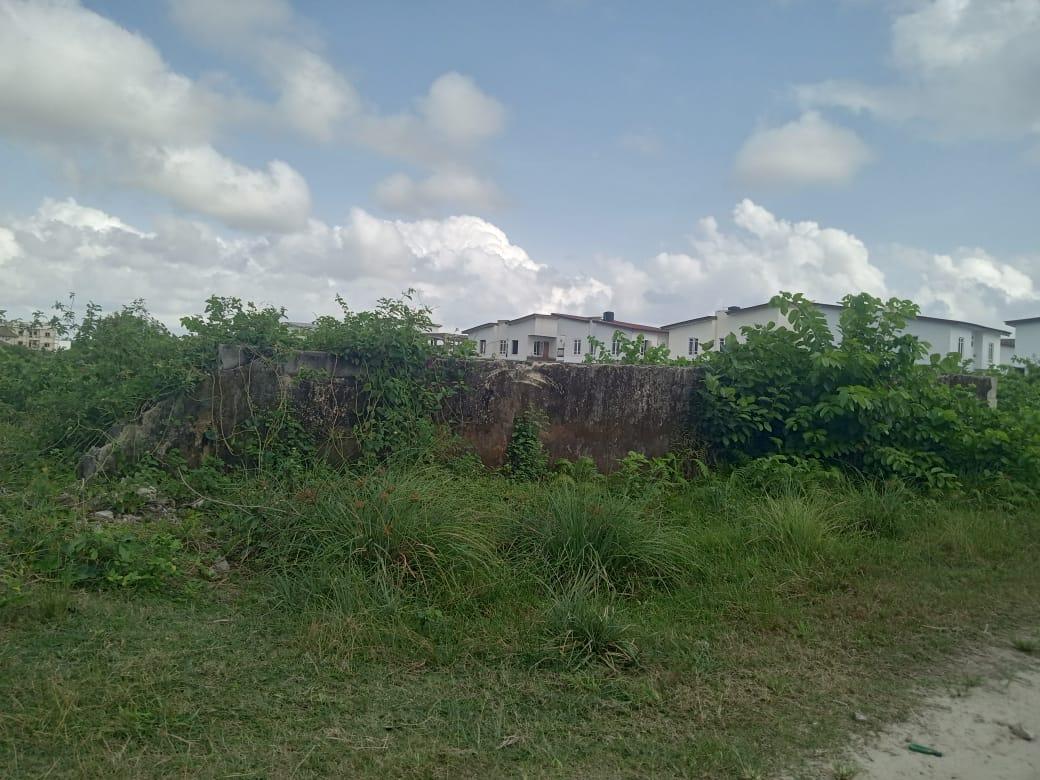 5 Acres of  partly fenced in a built up environment @ off Monastery Road, Sangotedo, Ajah