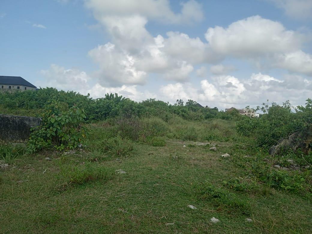 5 Acres of  partly fenced in a built up environment @ off Monastery Road, Sangotedo, Ajah