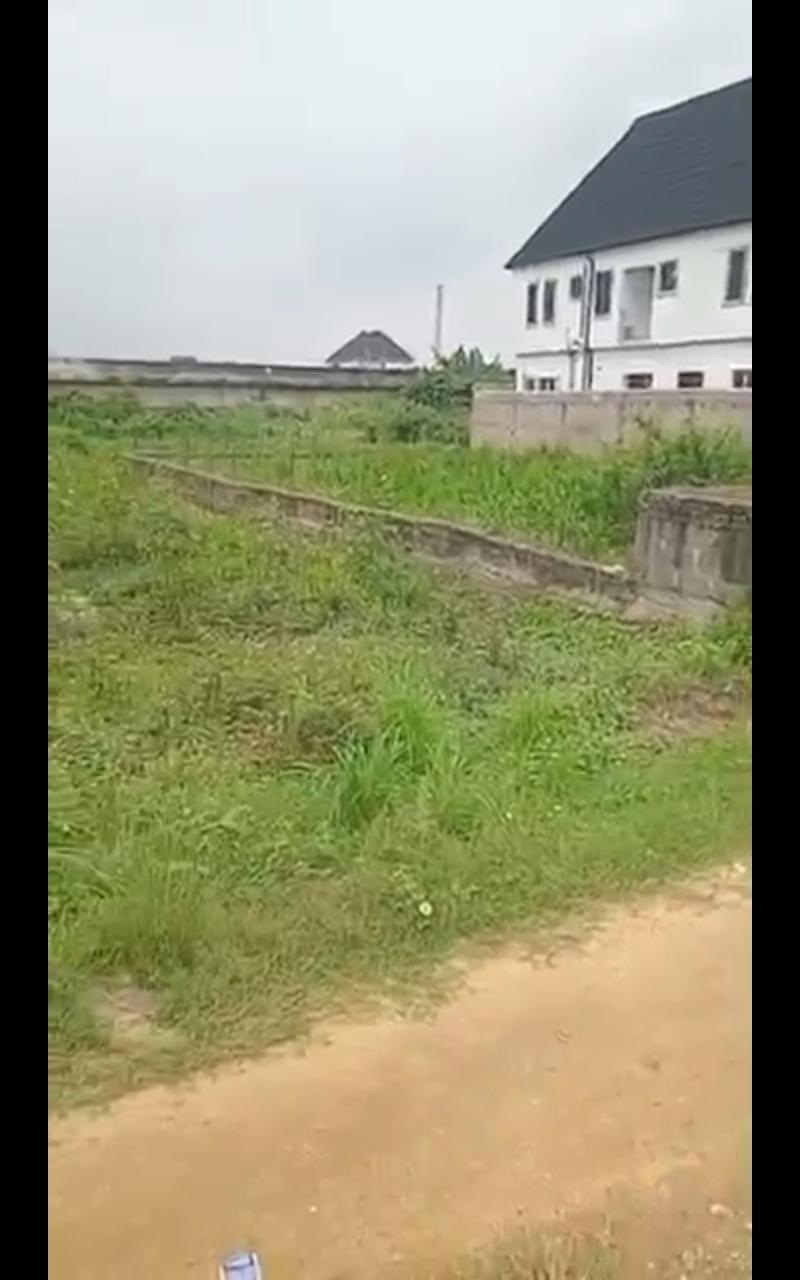 Half Plot of Land with Shops for Sale at Bucknor Estate