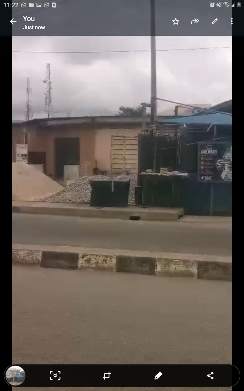 Full Plot of Land with 2 Shops & 3-Bedroom Apartment for Sale at Canoe Road