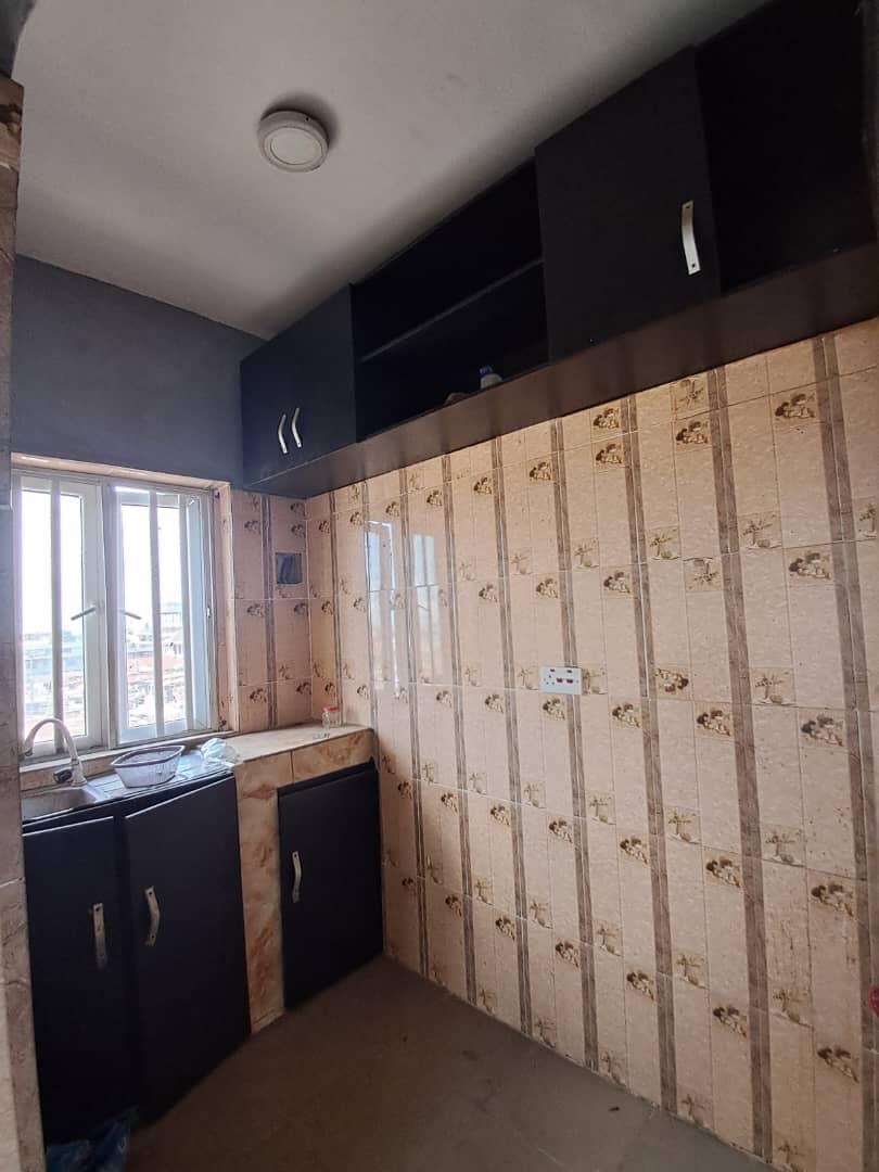 Very cute 2bedroom flat, kitchen cabinet,  separate prepaid meter, upstairs at Ilaje bariga