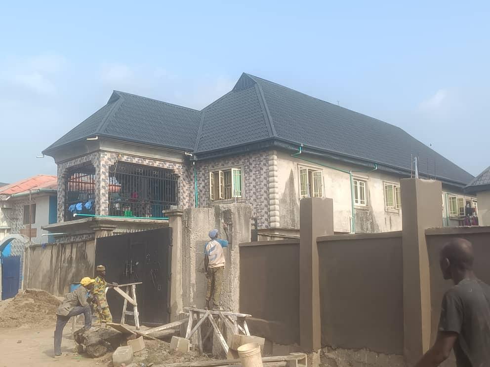 A Decent 4 nos of 2bedroom flats up & down on a Half plot of Land @ st Paul Angelican Church, Oke Afa