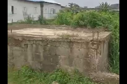 Half Plot Fenced with Shops for Sale at Bucknor Estate