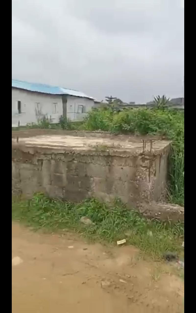 Half Plot Fenced with Shops for Sale at Bucknor Estate
