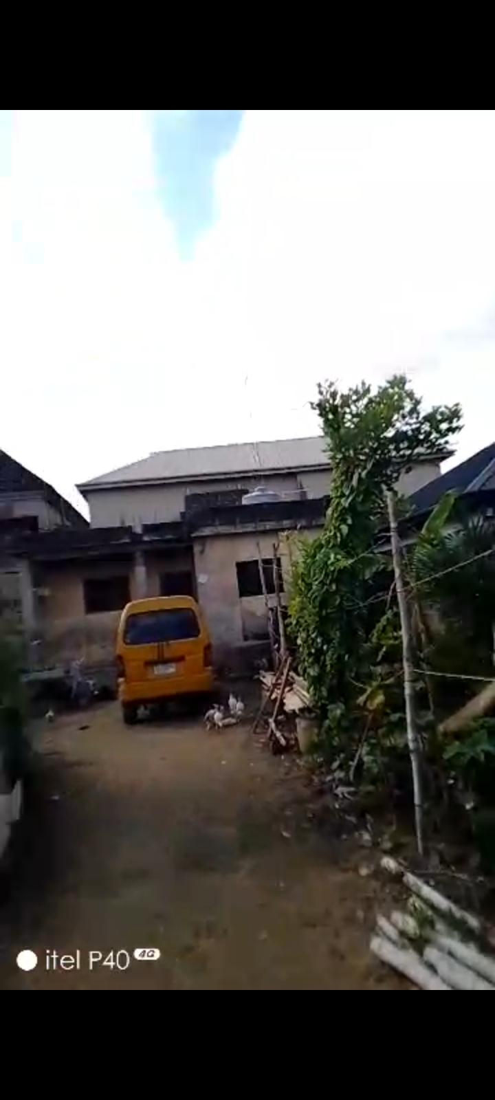 Half Plot of Land with Existing House 📍 Location: Ikotun–Igando Road, Lagos