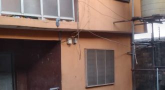 A solid storey building with Drive way vacant possession consisting of 2nos of 2bedroom flat upstairs with 3nos of ordinary room and Parlour downstairs and 4 nos of ordinary room downstairs on a plot